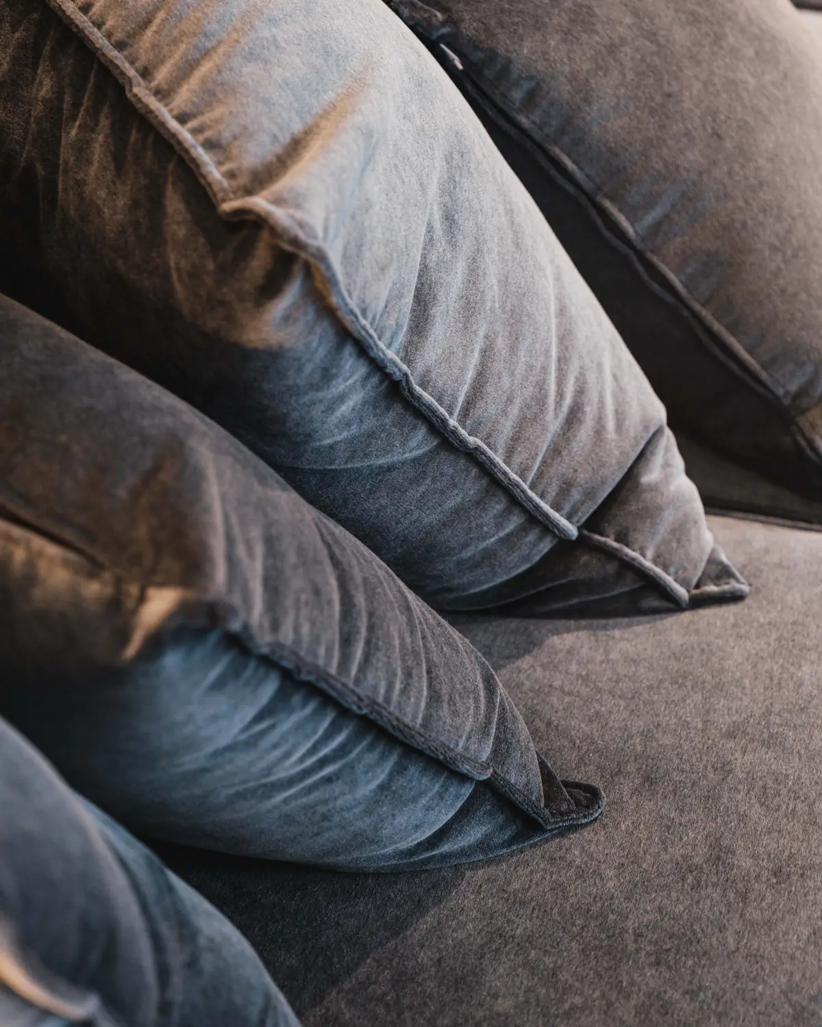 PLACEHOLDER: cushions on a couch, standing in for two Monolit covers together.